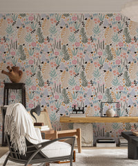 Modern living area featuring a recliner and nature-themed flower pattern wallpaper.
