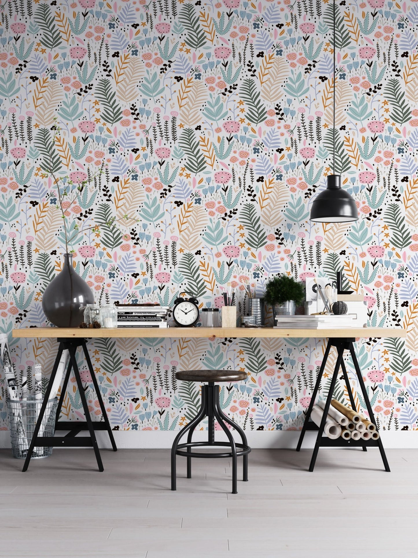 Home office setup with a black desk and Colorful Leaves and Flower Repeat Pattern Wallpaper.