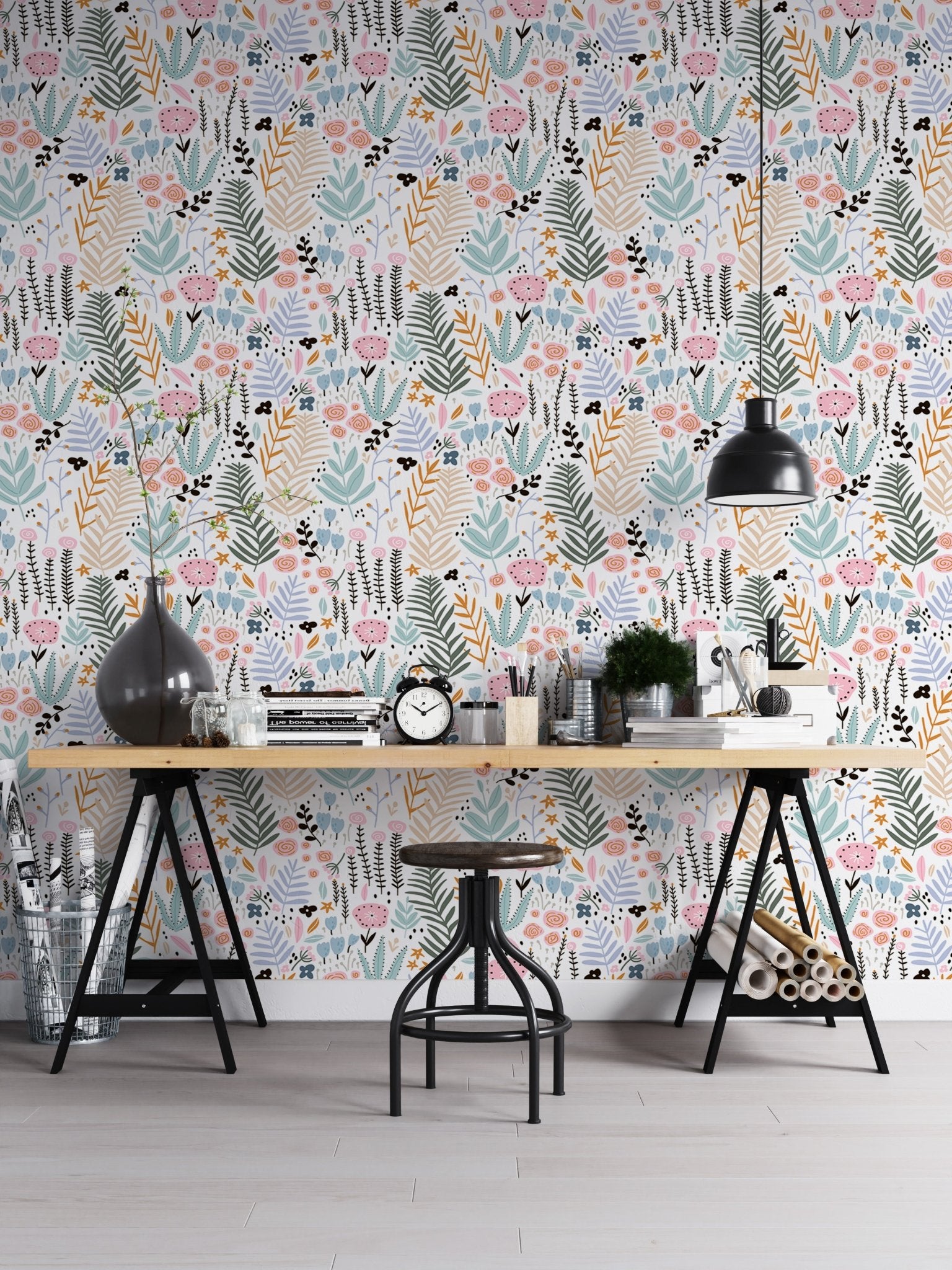 Home office setup with a black desk and Colorful Leaves and Flower Repeat Pattern Wallpaper.