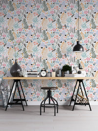 Home office setup with a black desk and Colorful Leaves and Flower Repeat Pattern Wallpaper.