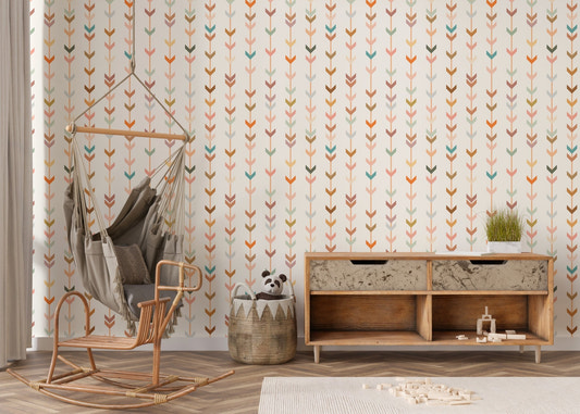 Vertical v-shaped elements on wallpaper in a living room with rocking chair.