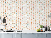 Kitchen backsplash area featuring colorful line elements geometric wallpaper above a counter.