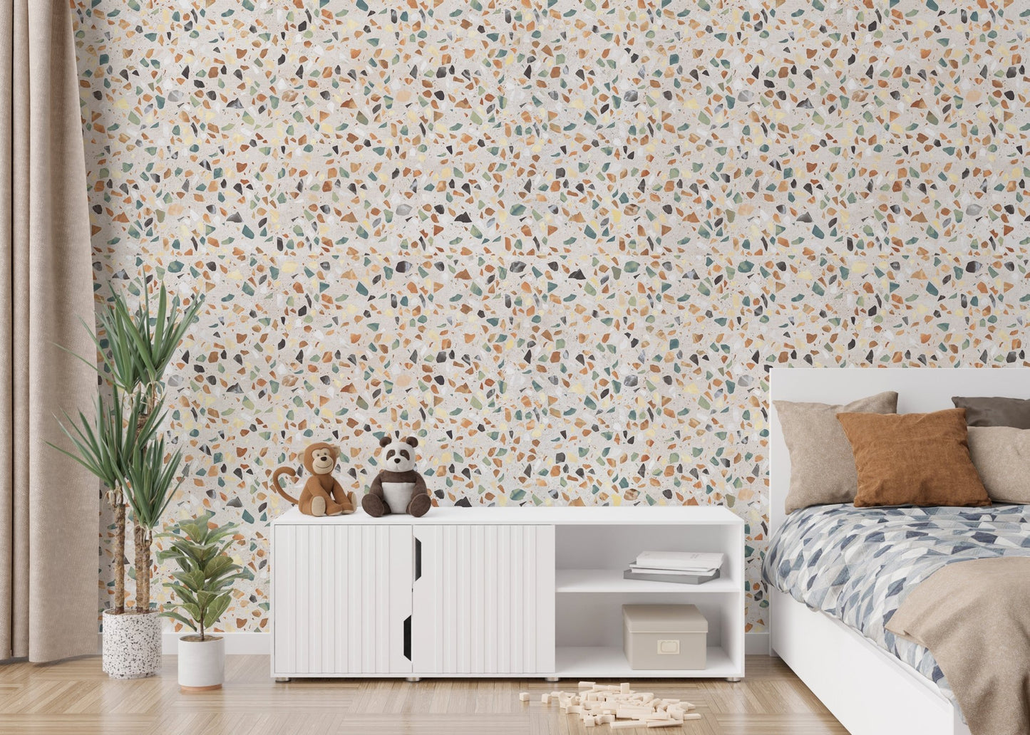 Children's bedroom featuring white furniture and colorful mosaic wallpaper.