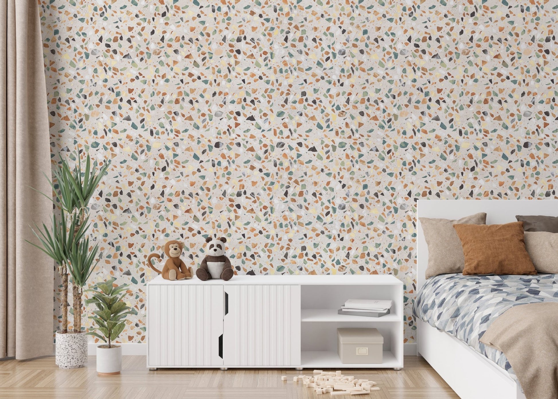 Children's bedroom featuring white furniture and colorful mosaic wallpaper.