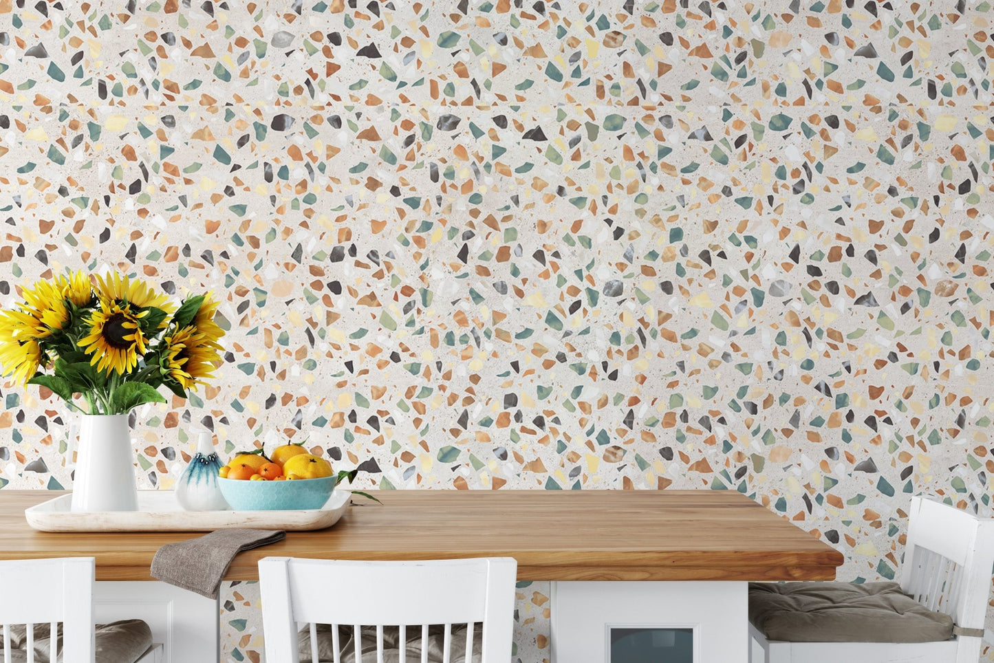 Kitchen dining area with terrazzo texture wallpaper on the main wall.