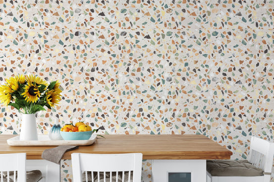 Kitchen dining area with terrazzo texture wallpaper on the main wall.