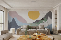Large sun and pink mountain wall mural for a sunlit seating area.