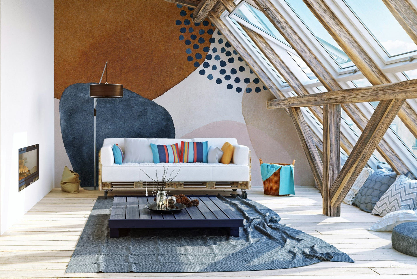 Attic living space with skylights and navy blue abstract wall mural.