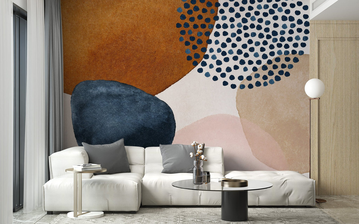 Navy blue and beige watercolor mural with colorful tones in living room.
