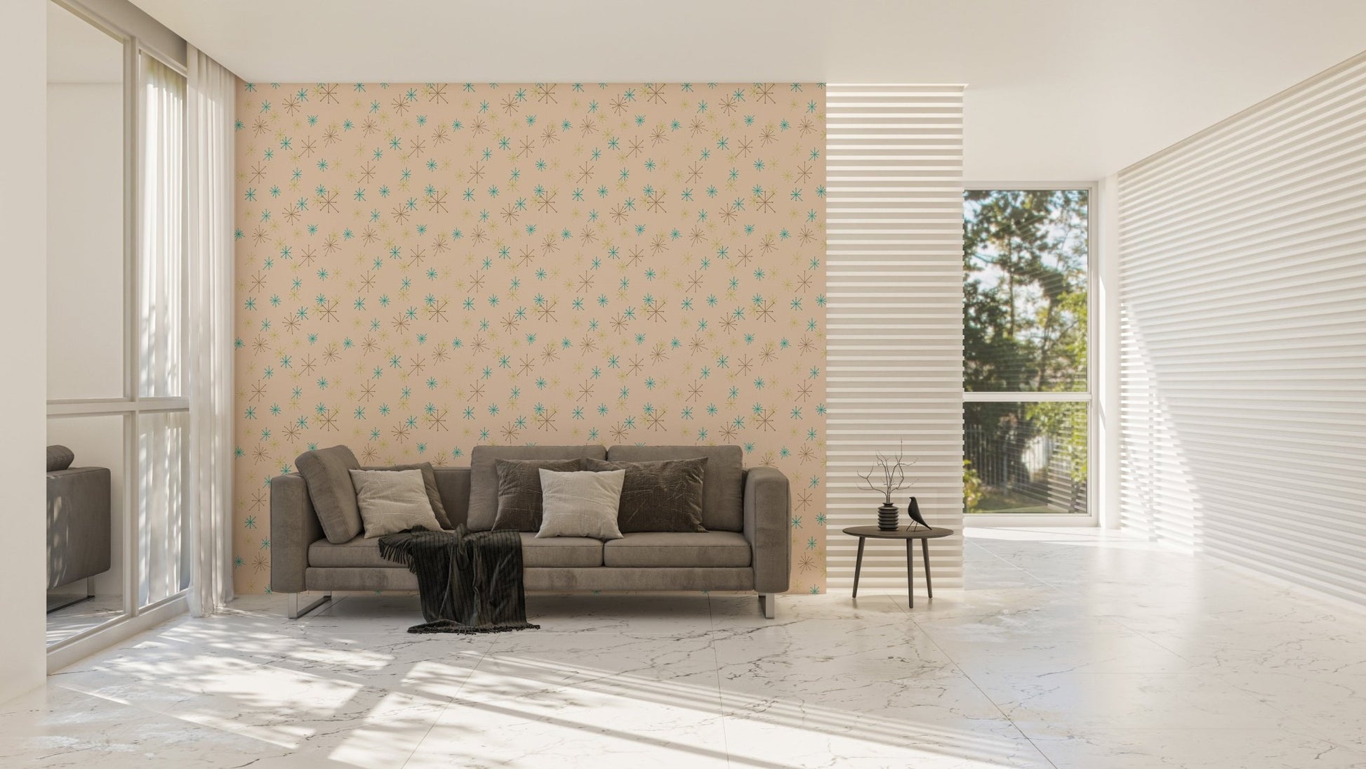 Minimalist living room featuring a grey sofa against a colorful snow fleck wall mural.