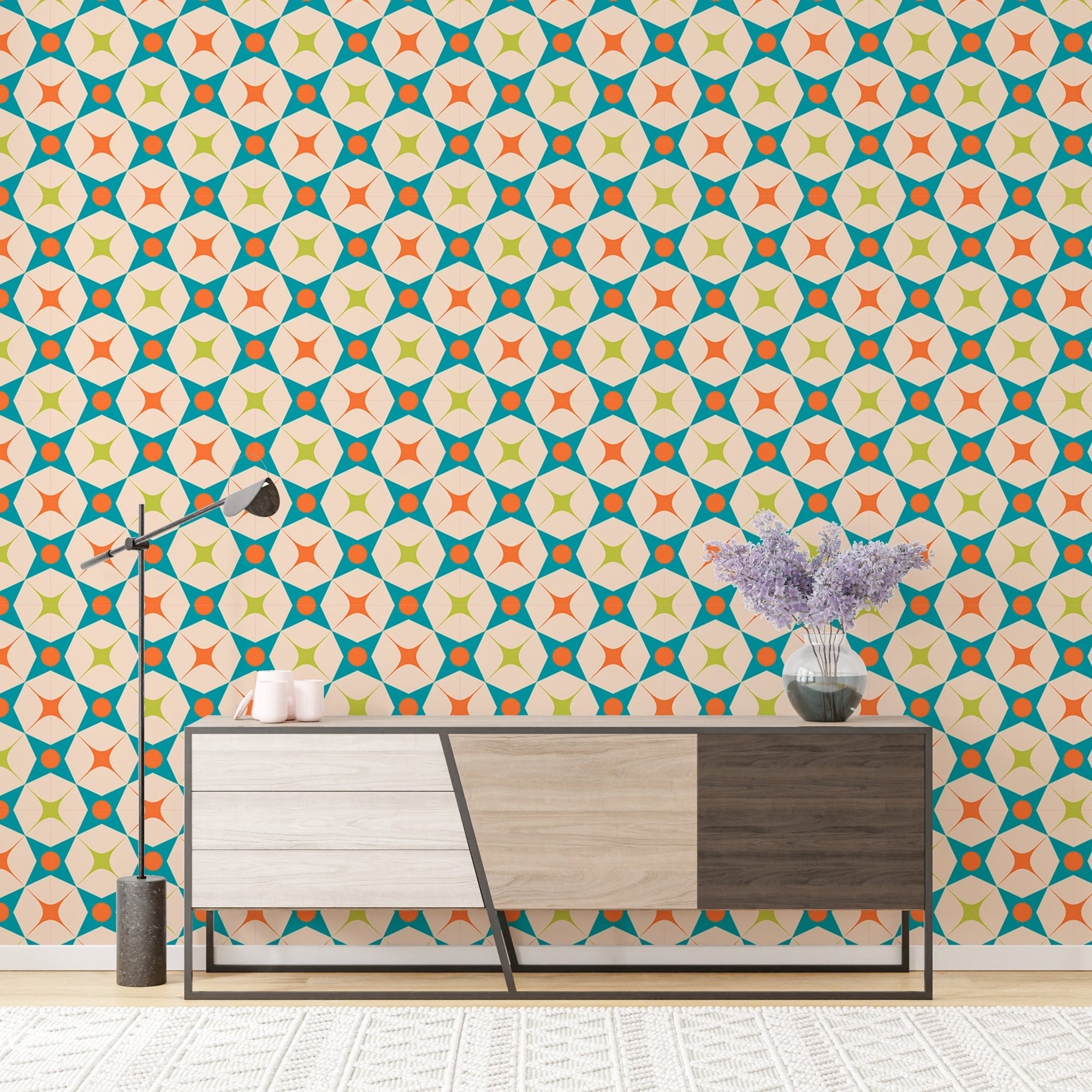 Retro teal and orange star wall mural on living room feature wall.