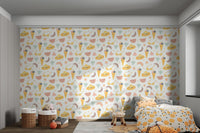 Pastel summer motif wallpaper with fruit and sunglasses for kids bedroom.