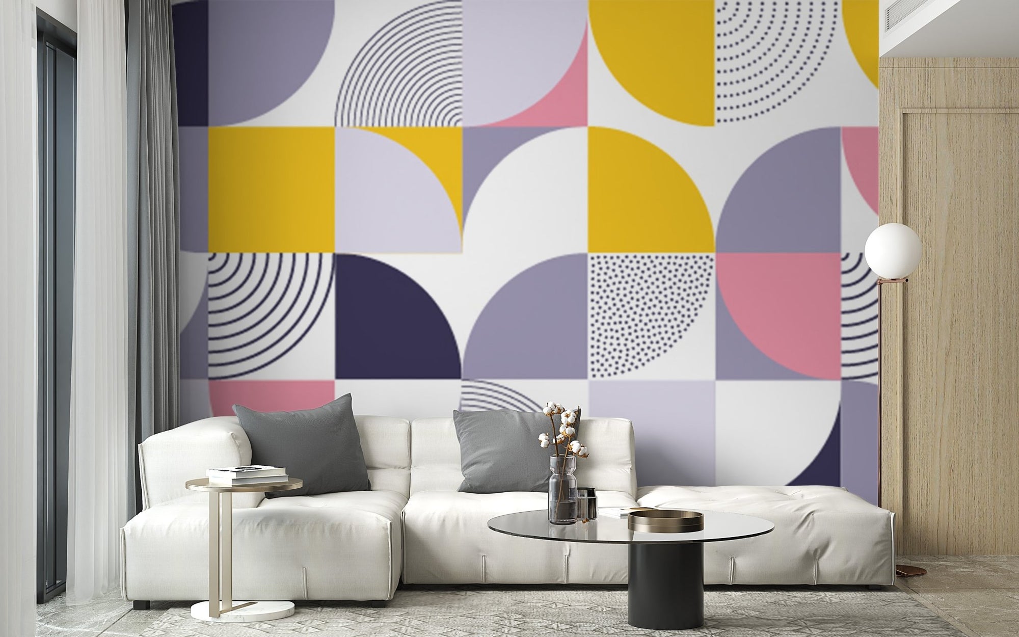 Colorful Swiss Geometric Shapes Wallpaper in a modern living room with a white sofa.