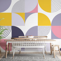 Dining area wallpaper with mustard and navy blue geometric pattern designs.