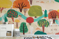 Playful forest wall mural with small figures and a dog in the leaves.