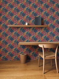 Colorful Tropical Flower Peel and Stick Wallpaper in a study with a wooden chair.