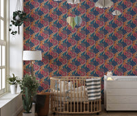 Colorful Tropical Flower Peel and Stick Wallpaper in a nursery with a wooden crib.