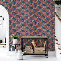 Flower pattern wallpaper in a hallway with a black metal storage shelf.