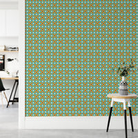 Teal and gold geometric art wall mural in a minimalist workspace setup.