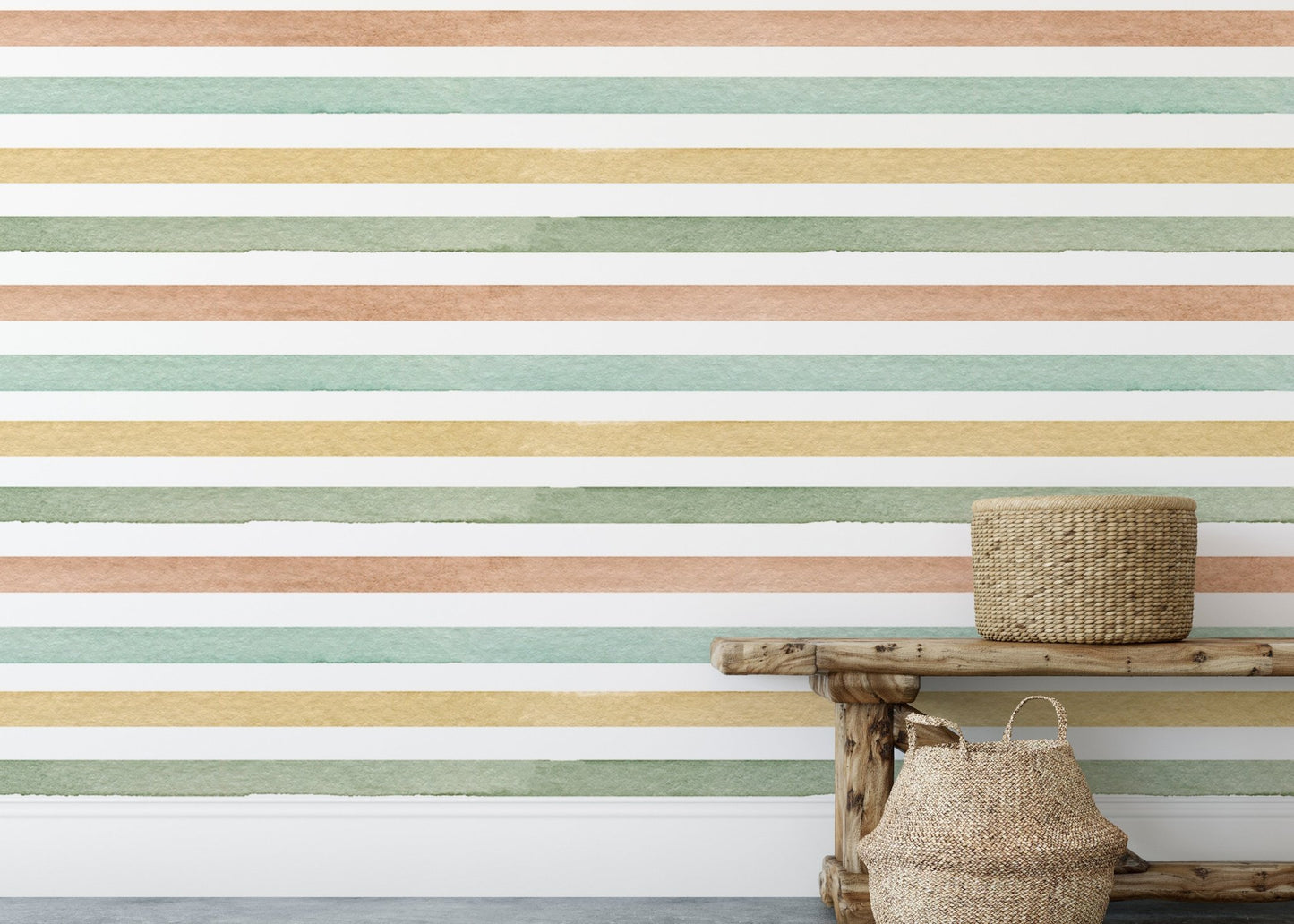 Textured watercolor striped wallpaper behind a rustic wooden shelf and baskets