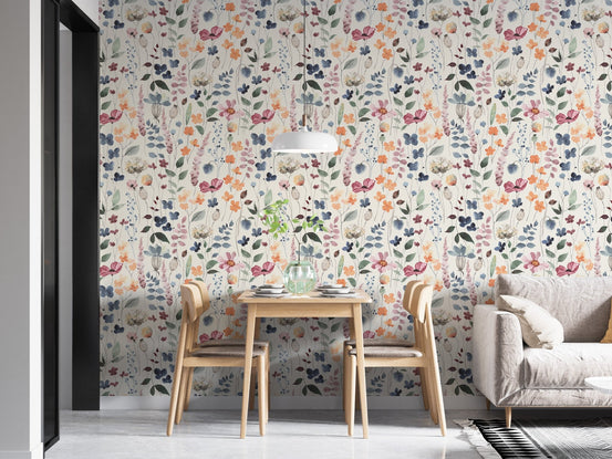 Multi-color floral wallpaper with green leaves and blue stems in dining area.