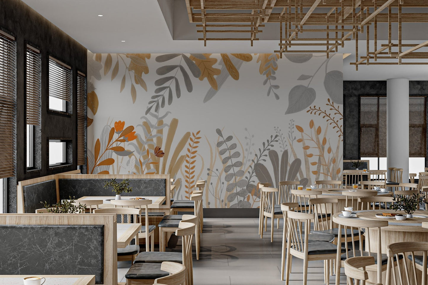 Dining area wall mural with grey and ochre watercolor leaf patterns.