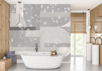 Bathroom feature wall using a concrete grey terrazzo wall mural.