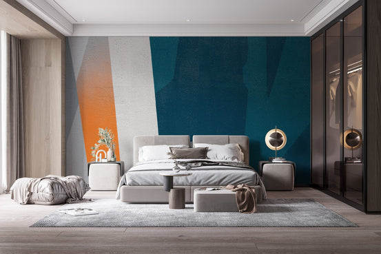 Blue and orange concrete wall mural behind a king size bed in a modern bedroom.