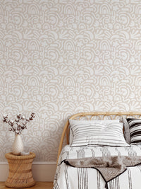 Contemporary Abstract Art Scandinavian Wallpaper in a bedroom with striped bedding.