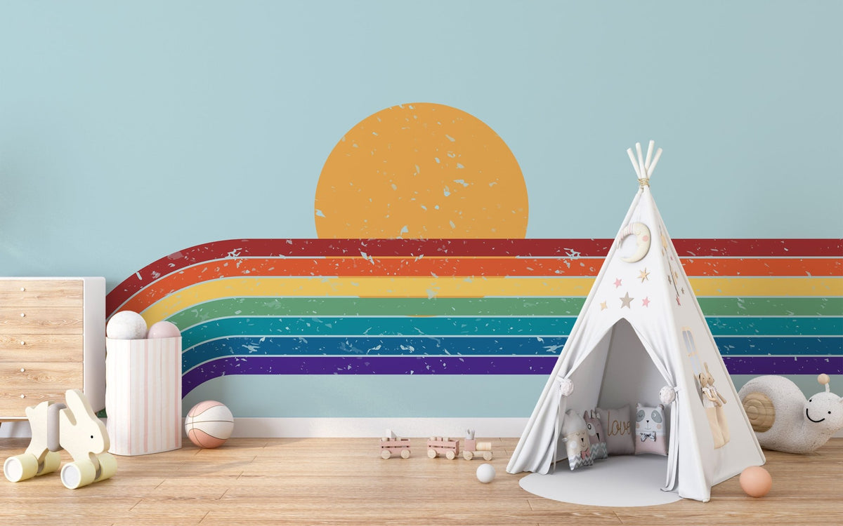 Playroom furniture set against a rainbow bliss wall mural