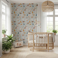 Soft blue wall covering with various cat breeds.