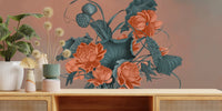 Wooden console table in front of a terracotta floral wall mural.