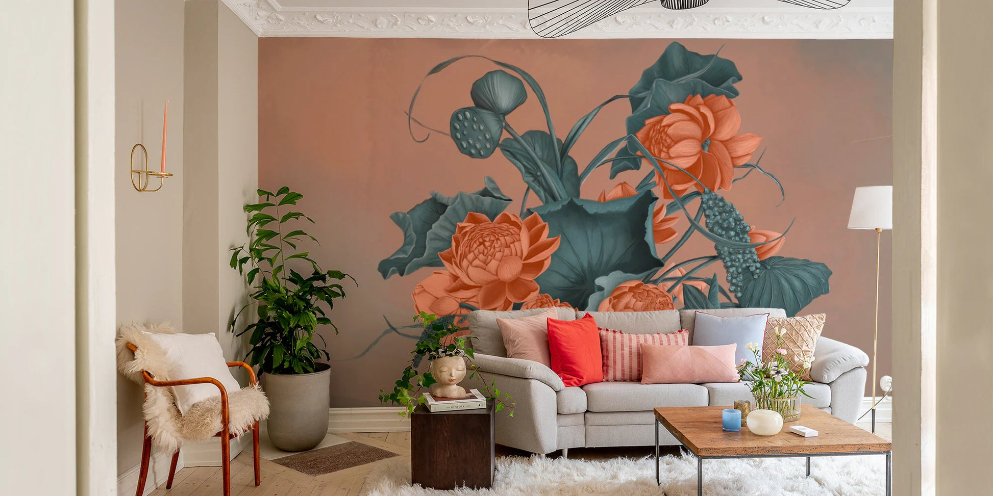 Living space with a sofa and a floral wall mural behind the seating.