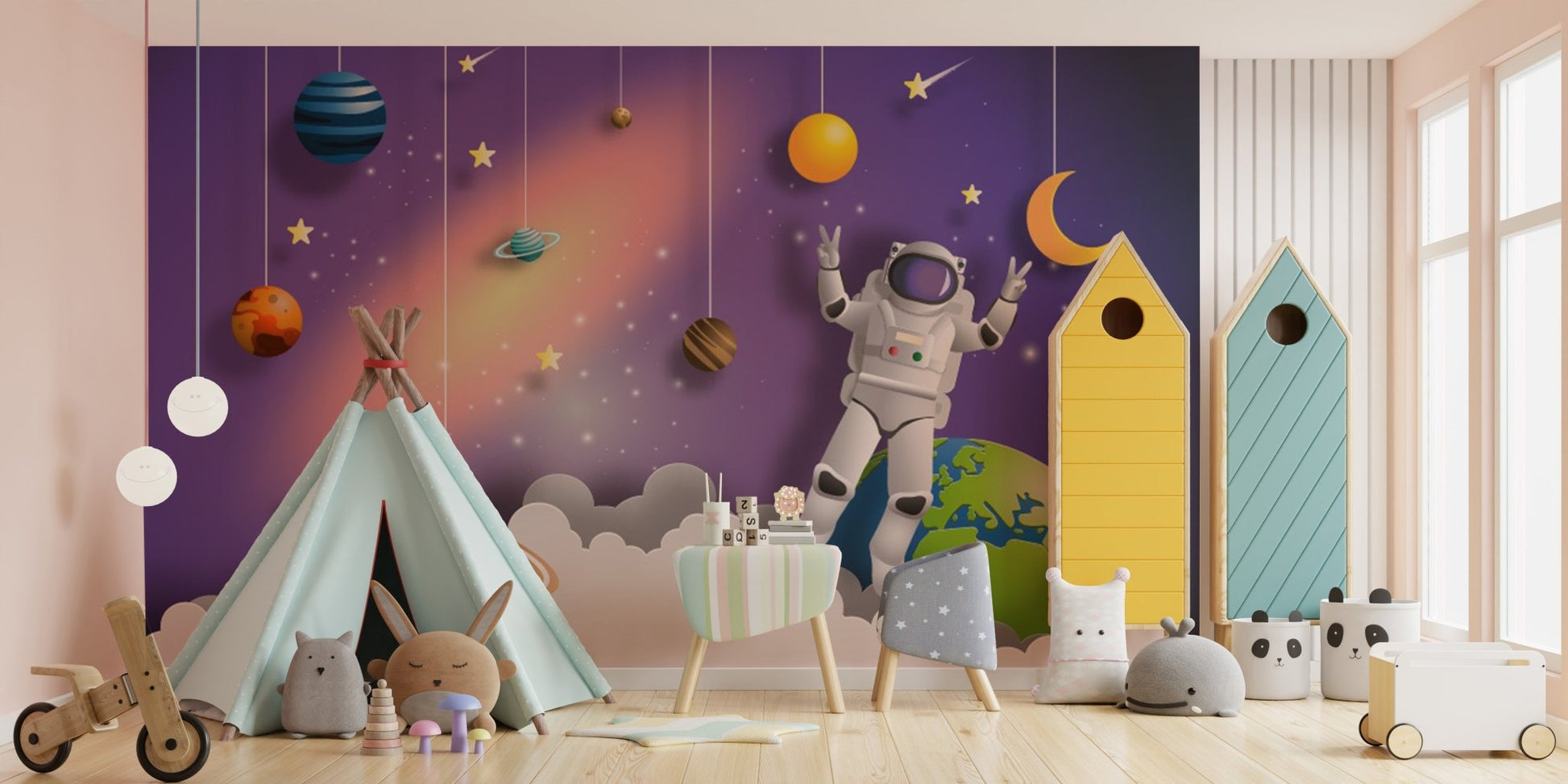 Outer space mural with astronauts, stars, and galaxies for playroom walls.
