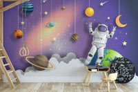 Astronaut mural inspiring curiosity with a cosmic space design for creative kids room.