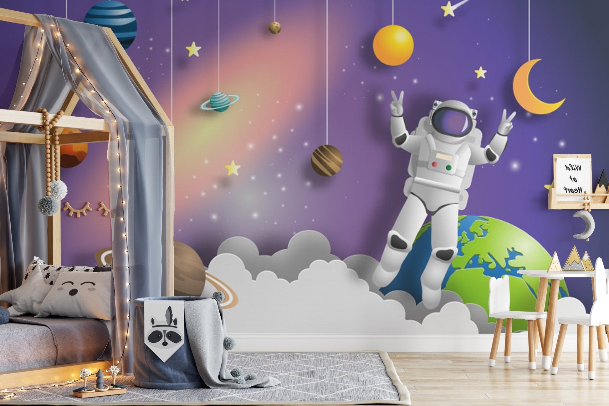 Astronaut mission mural adding a galactic touch to kids room spaces.

