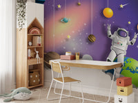 Cosmic explorer astronaut mural for inspiring interstellar study room decor.
