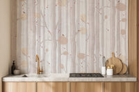 Minimalist cream tree wall mural in a kitchen with wooden countertops.