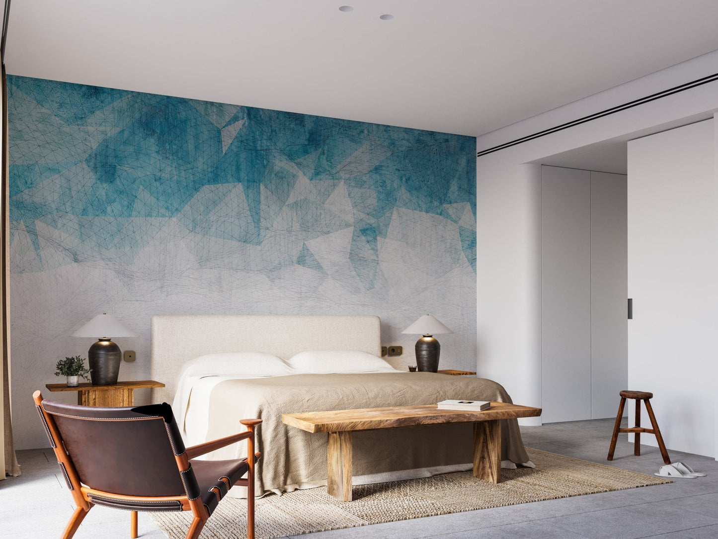 Bedroom wall mural featuring crumbled blue color with wooden bench.