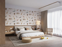 Cute jungle wall mural for bedroom in soft beige with playful animals.