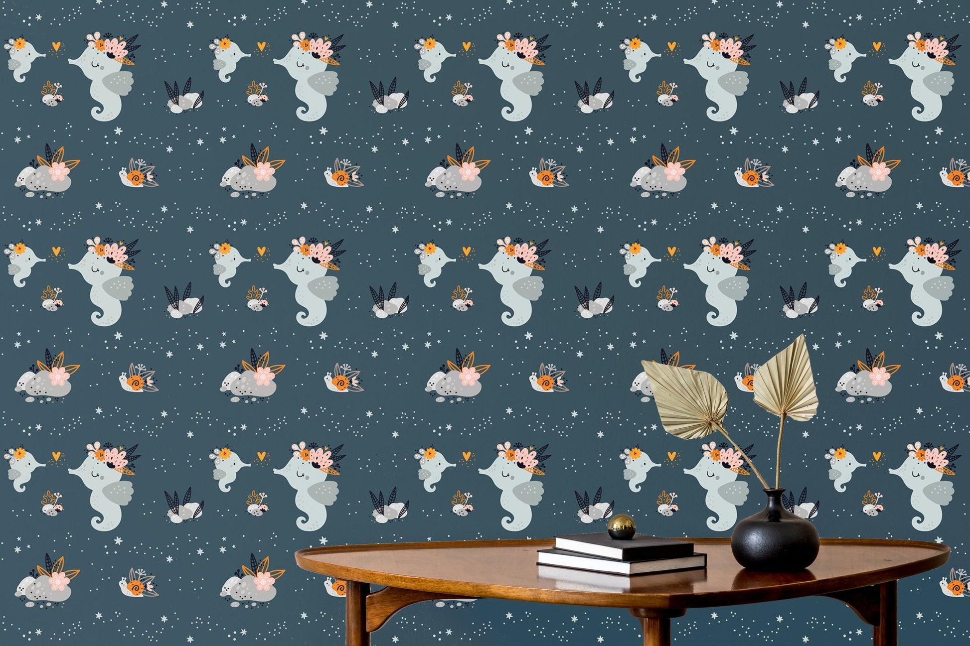 Aquatic animal wallpaper featuring whales and jellyfish behind a wooden desk setup.