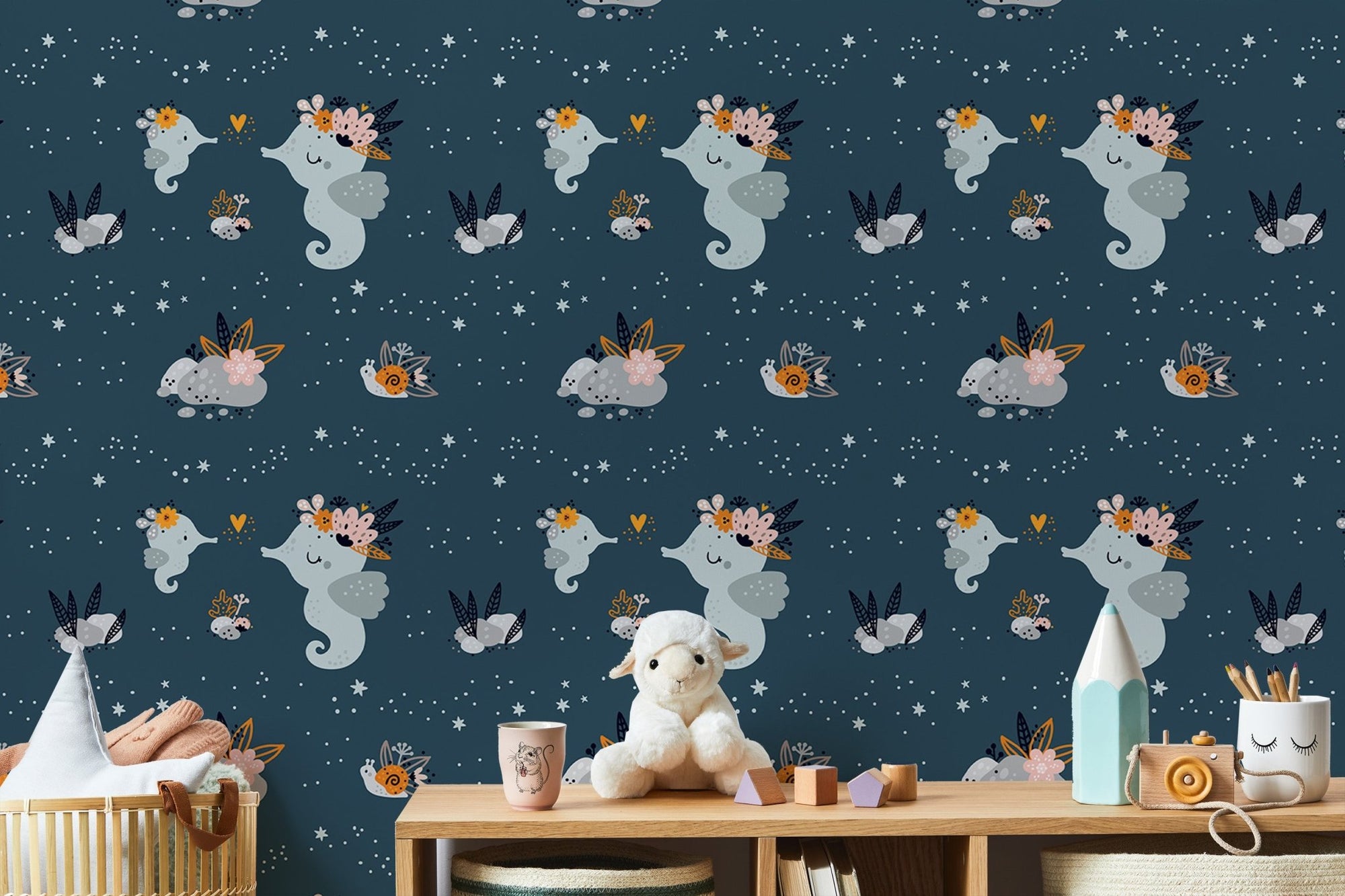 Adorable baby sea animals wallpaper with repeat pattern in playroom.