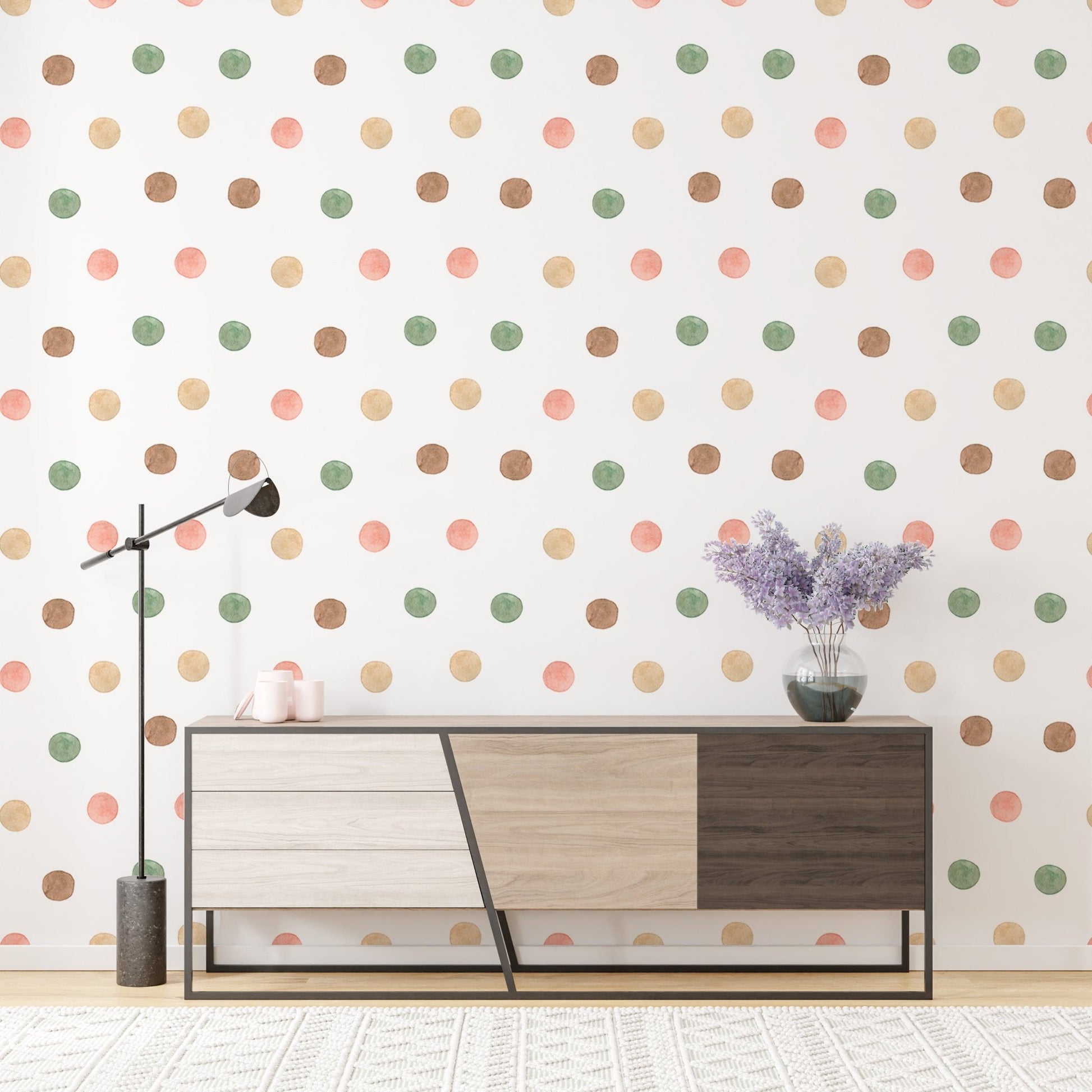 Contemporary sideboard placed against a muted polka dot wallpaper.