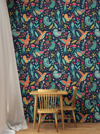 Bird and floral wallpaper in a contemporary dining room with small table and chair.