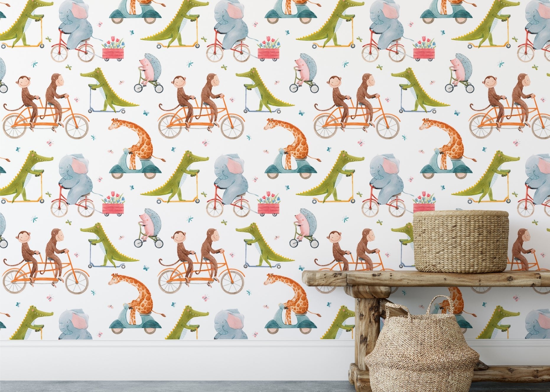 Cartoon crocodile and elephant on bikes wall mural behind a rustic wooden shelf.