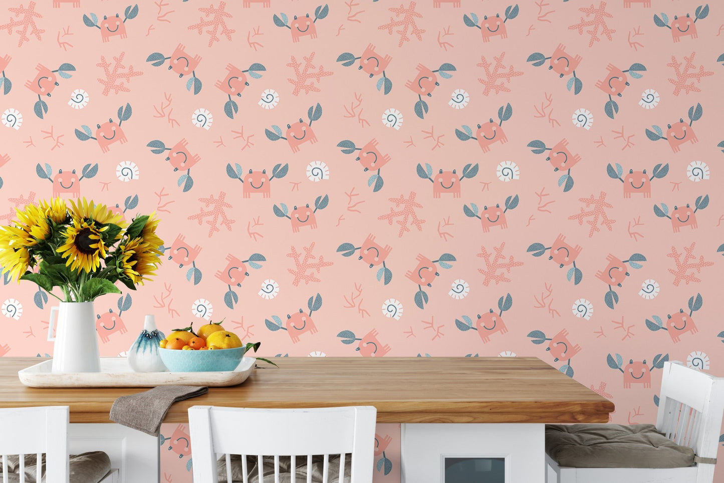 Pink pastel wallpaper featuring crabs and sea shells in a kitchen breakfast nook.
