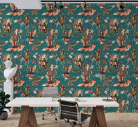 Teal forest animal wallpaper behind a modern office desk and white chair.