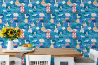 Dining room table set against a lighthouse and nautical ship wallpaper.