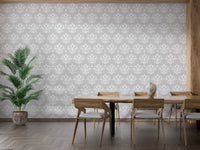 Damask Repeat Pattern Vintage Look Wallpaper in a dining room with wooden chairs.