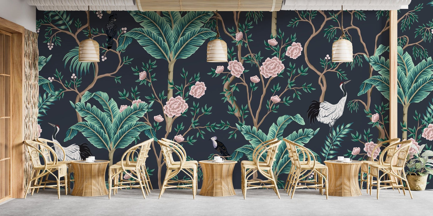 Dark background Green leaves Flower Wall mural in a cafe with rattan chairs and tables.